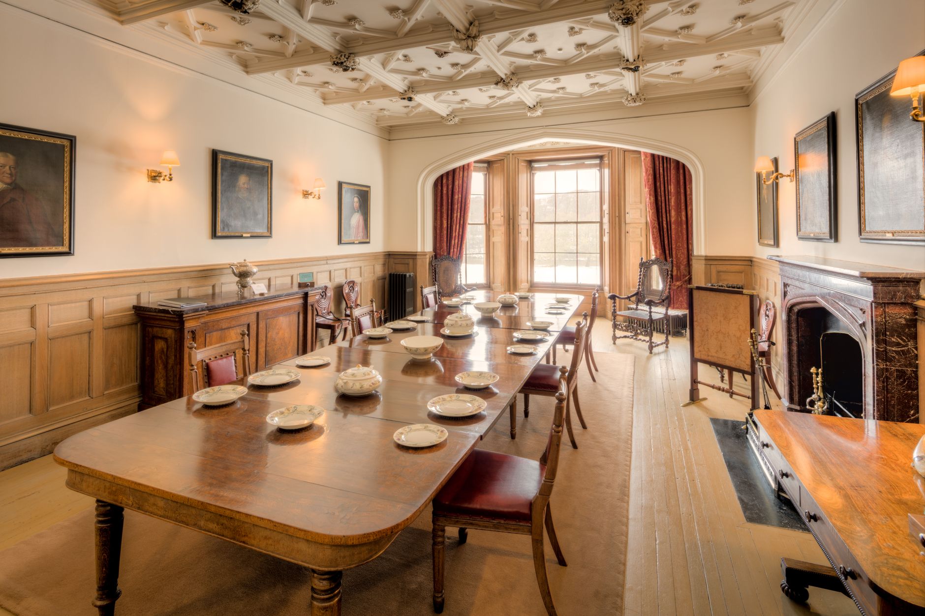 Elegant corporate art advisory meeting in a modern gallery setting