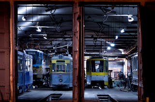 Green and Yellow Train in Train Station