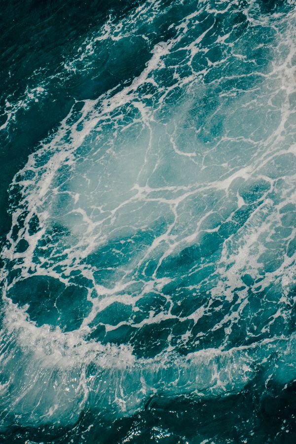 Ocean surf from above, photo by Marina Grechko on Pexels