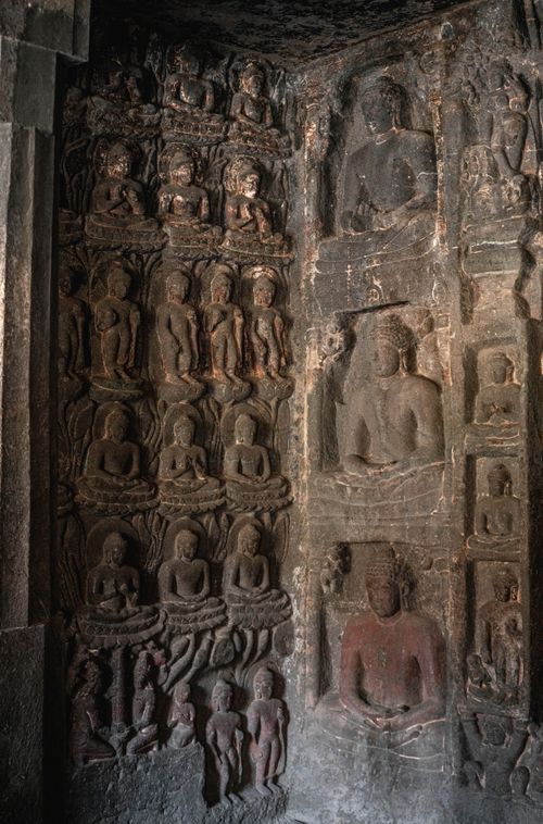 Free Intricate Buddhist carvings on cave walls, showcasing ancient art in Maharashtra, India. Stock Photo