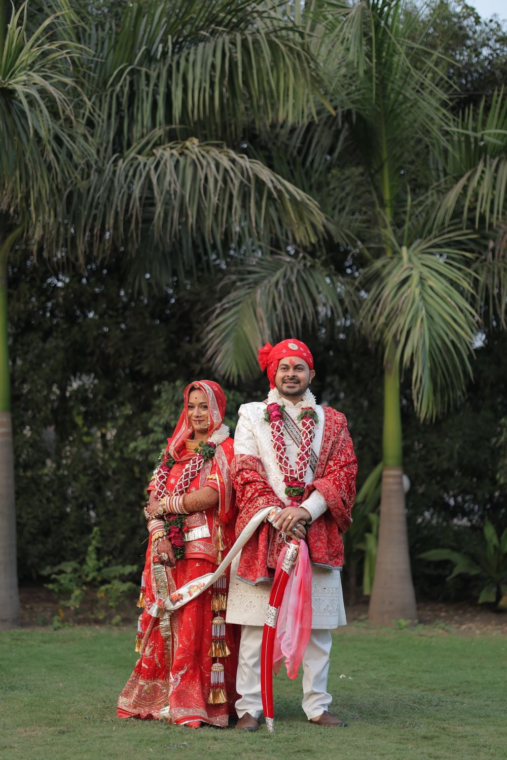 Traditional Indian Wedding Couple in Red Attire · Free Stock Photo