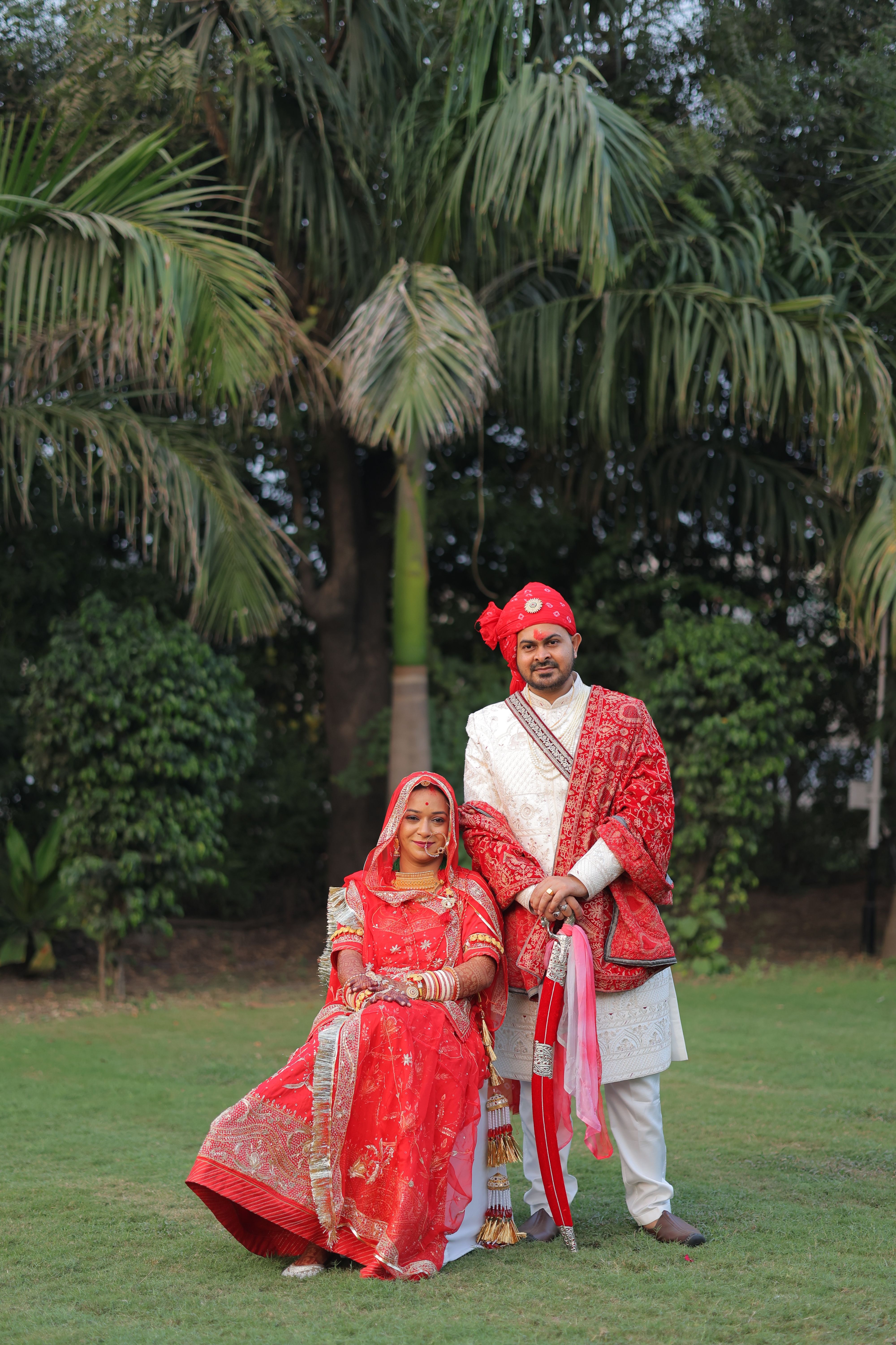 Indian Wedding Couple in Traditional Attire Outdoors · Free Stock Photo