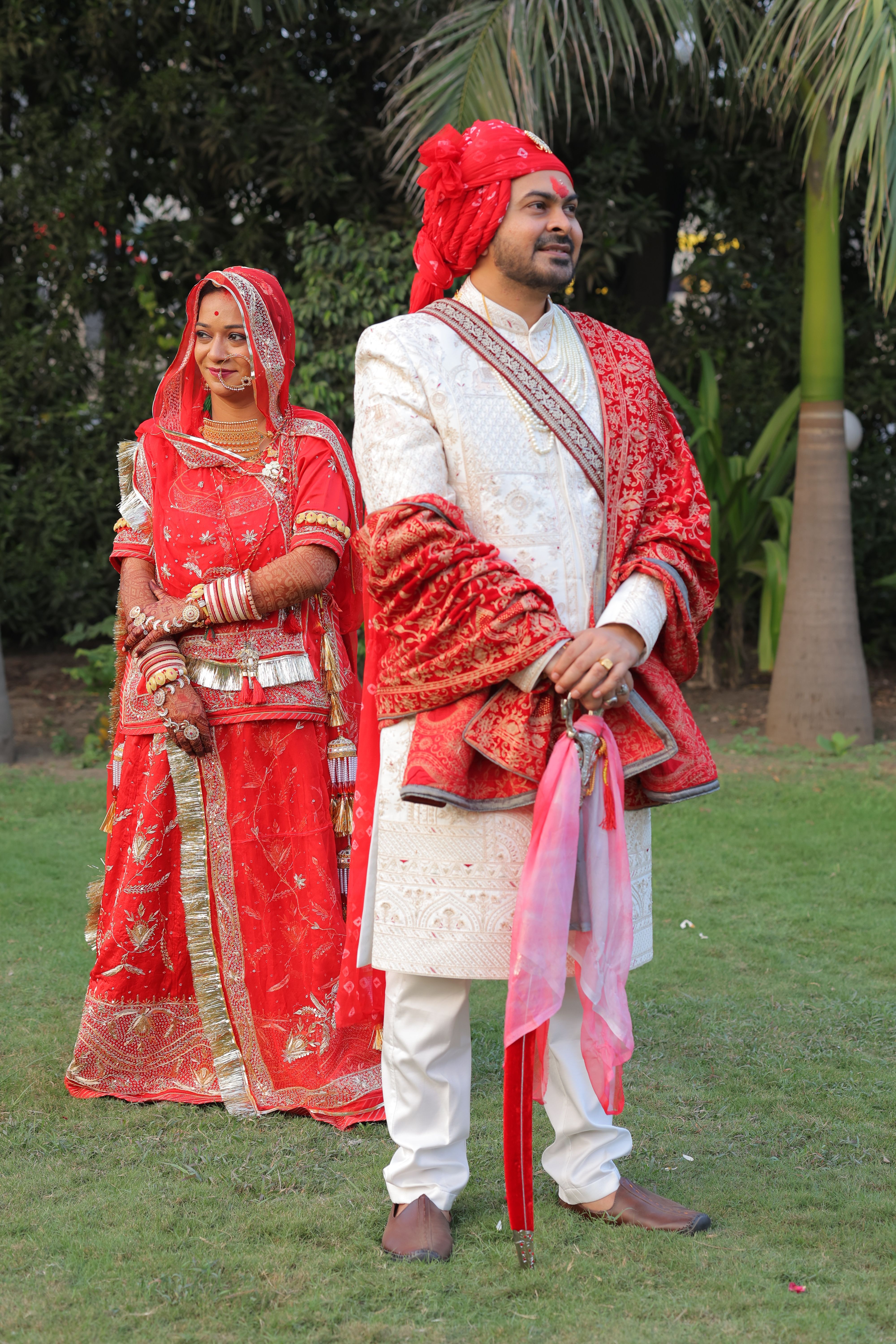 Traditional Indian Wedding Couple Posing Outdoors · Free Stock Photo