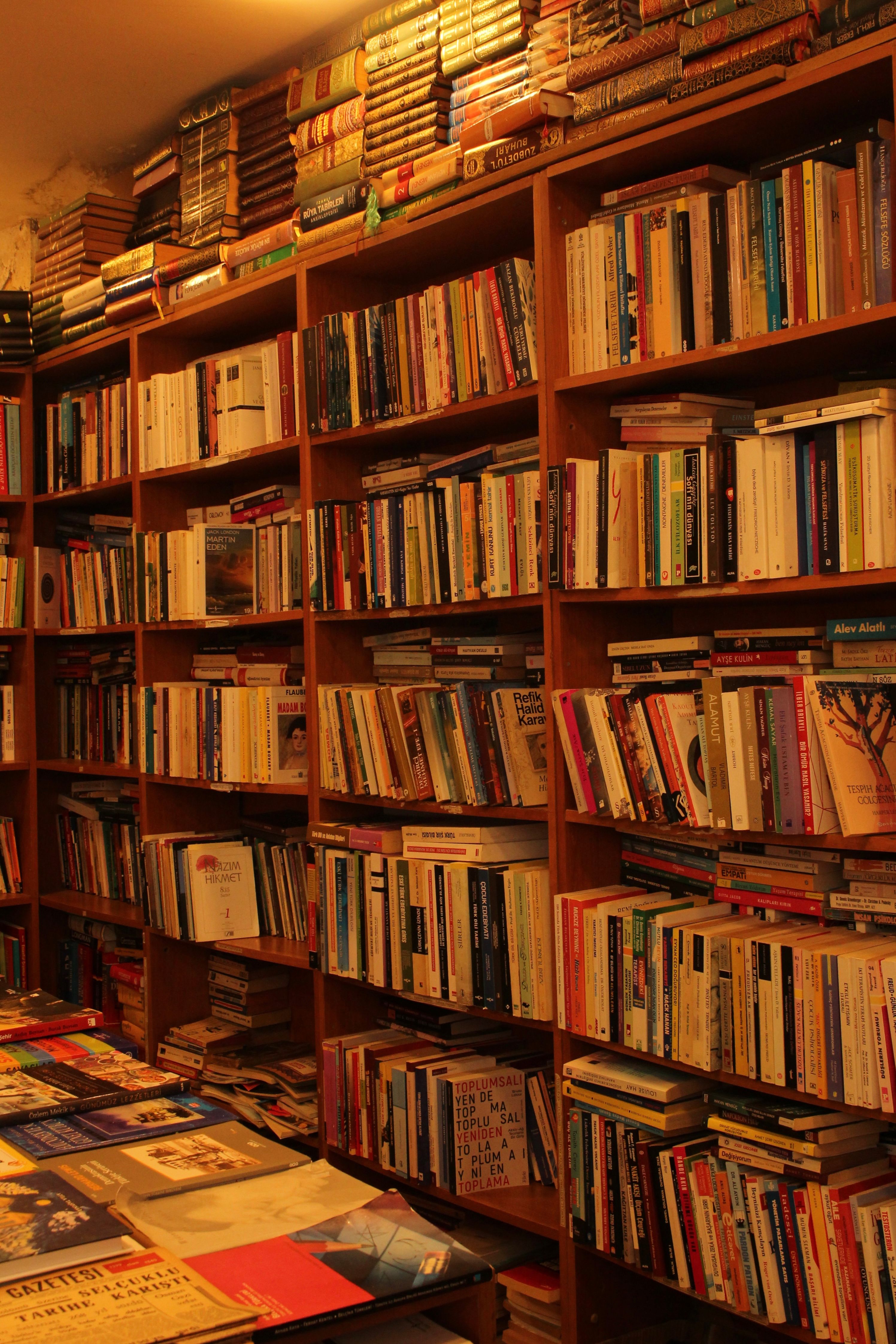 Cozy Bookstore Interior with Wooden Shelves · Free Stock Photo