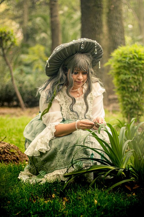 Retro Cosplayer Elegant Cosplay in Lush Park Setting · Free Stock Photo