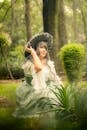 Victorian-Inspired Cosplay in a Lush Park Setting