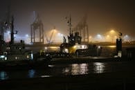 Foggy Night at Hamburg Port with Ships
