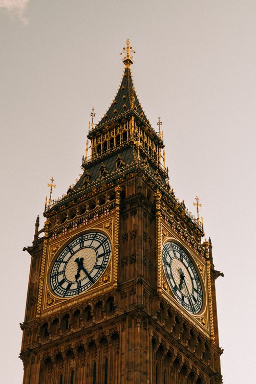 Free Close-up view of Big Ben clock tower in London during sunset, showcasing intricate architecture. Stock Photo