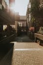 Urban Sunlit Alleyway with Architectural Elements