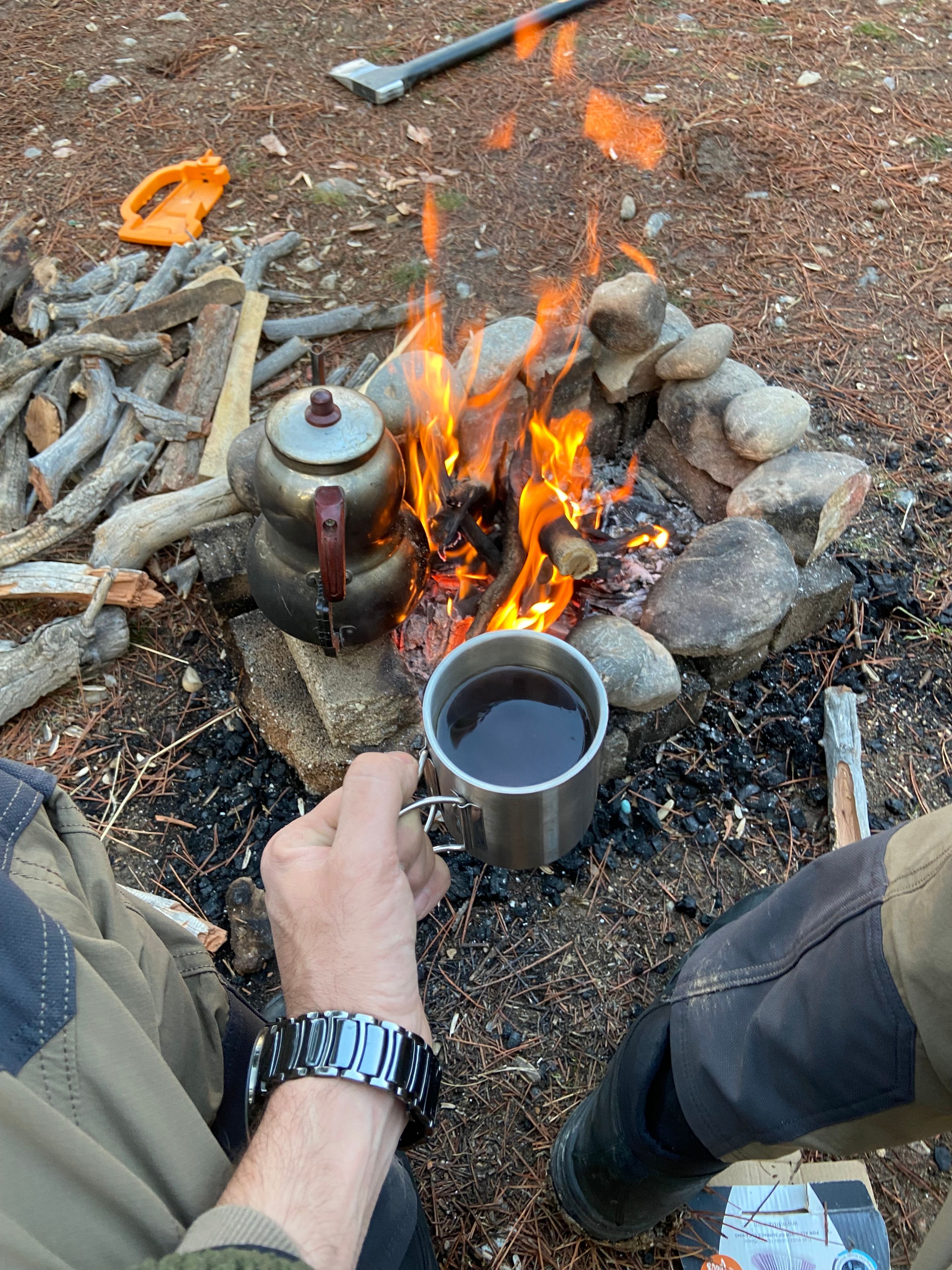 Enjoying freshly brewed coffee by a campfire in the woods of Kayseri, Turkey.