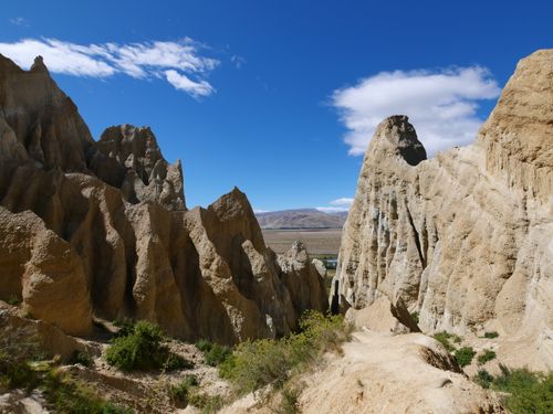 Free Explore dramatic rock spires and canyons in Twizel's stunning landscape under a clear blue sky. Stock Photo