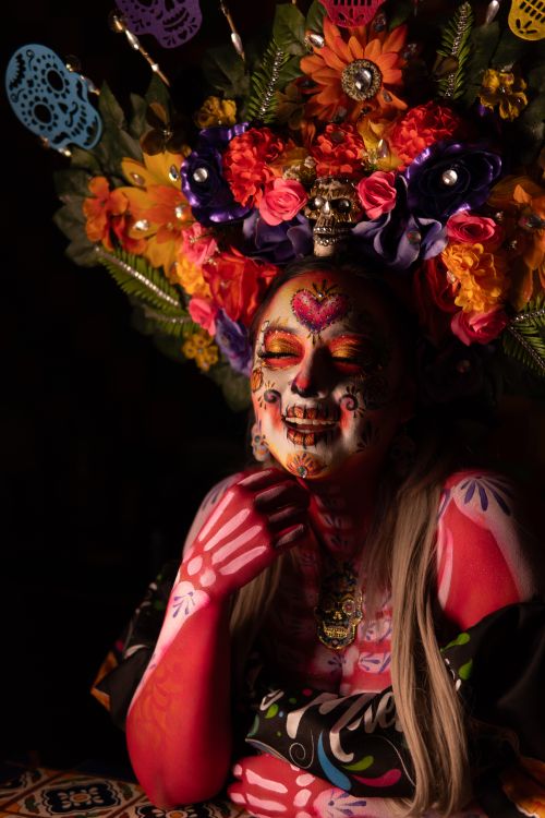 Free Colorful Catrina makeup with ornate floral headdress for Day of the Dead celebration in Mexico. Stock Photo