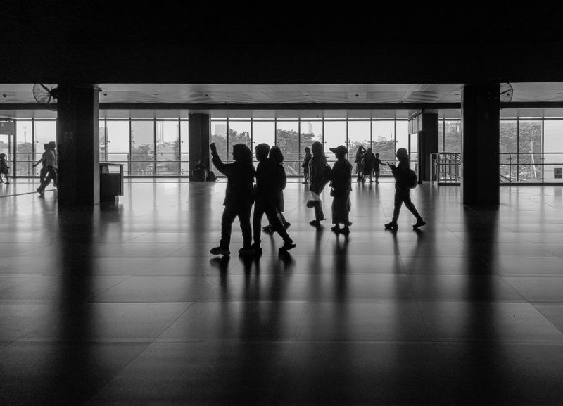 Black and White Indoor Motion Blur of People · Free Stock Photo