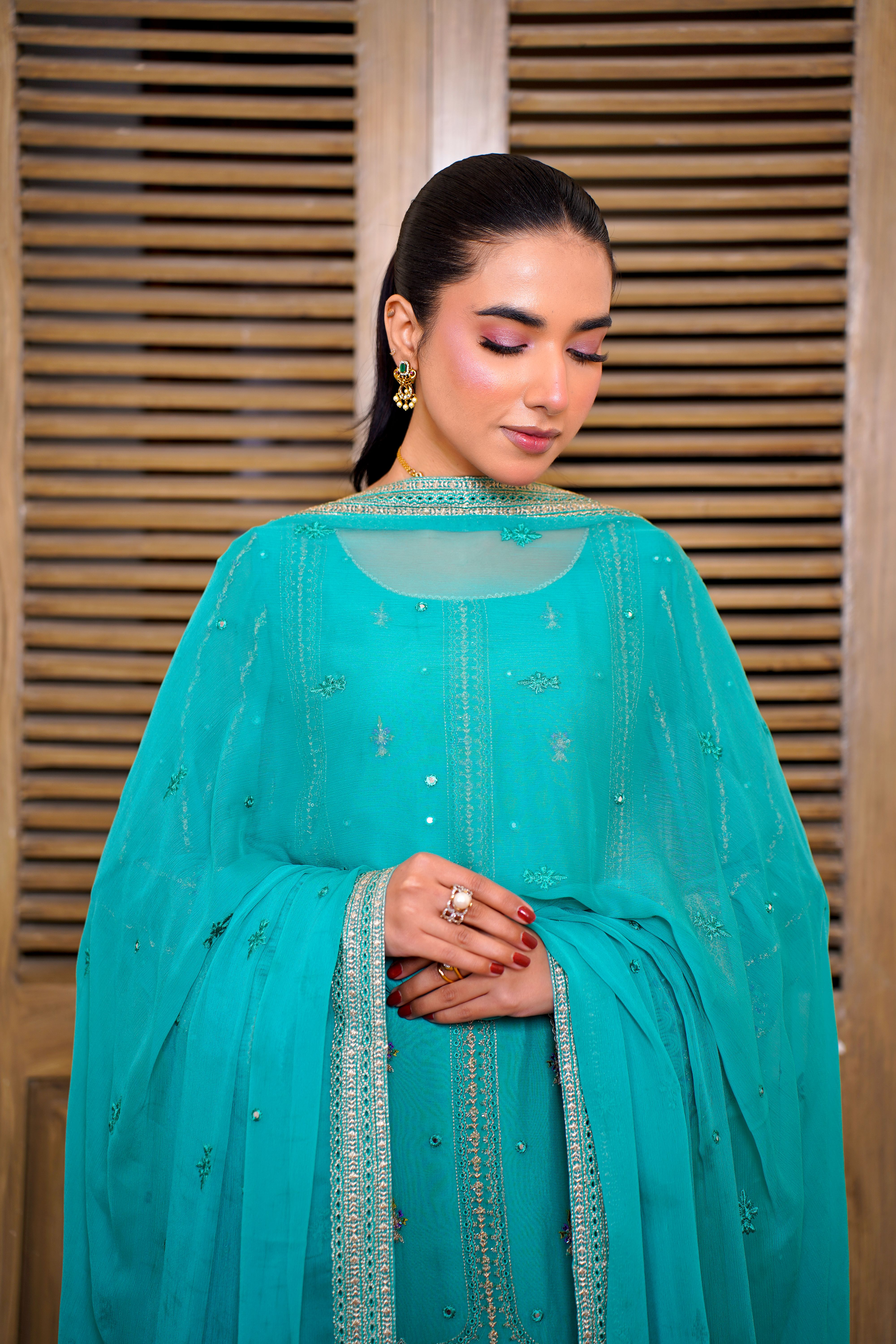 Charming portrait of a woman in an embroidered traditional eastern dress, Lahore.