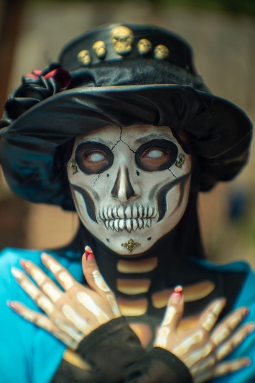 Free Close-up of a person wearing Catrina makeup and costume in Mexico City. Stock Photo