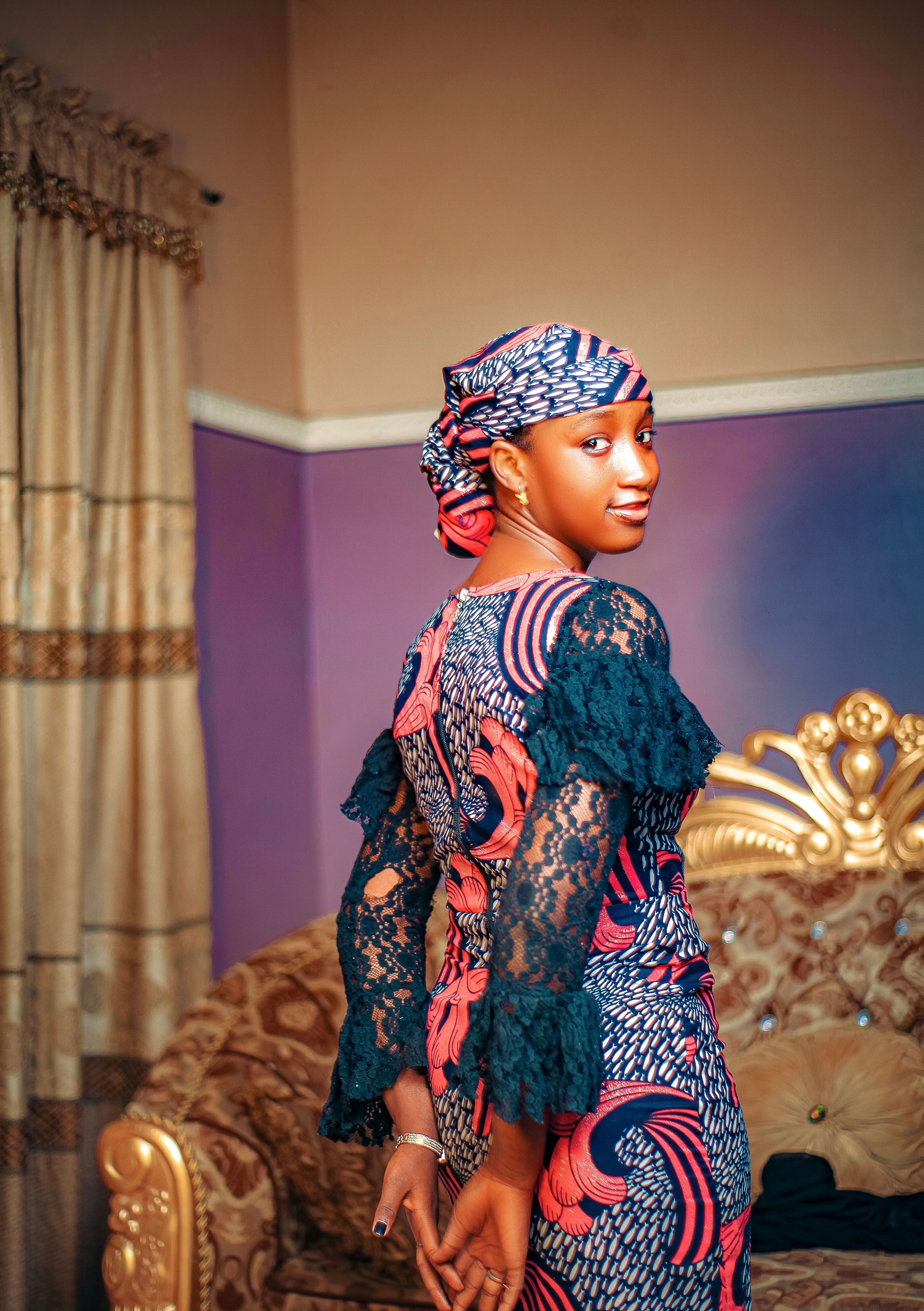 Woman in Traditional African Attire Indoors · Free Stock Photo