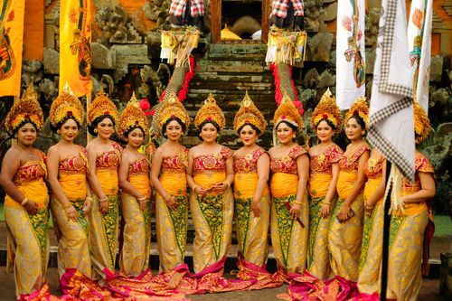 Free Group of Balinese women in traditional attire during a temple ceremony in Bali, Indonesia. Stock Photo