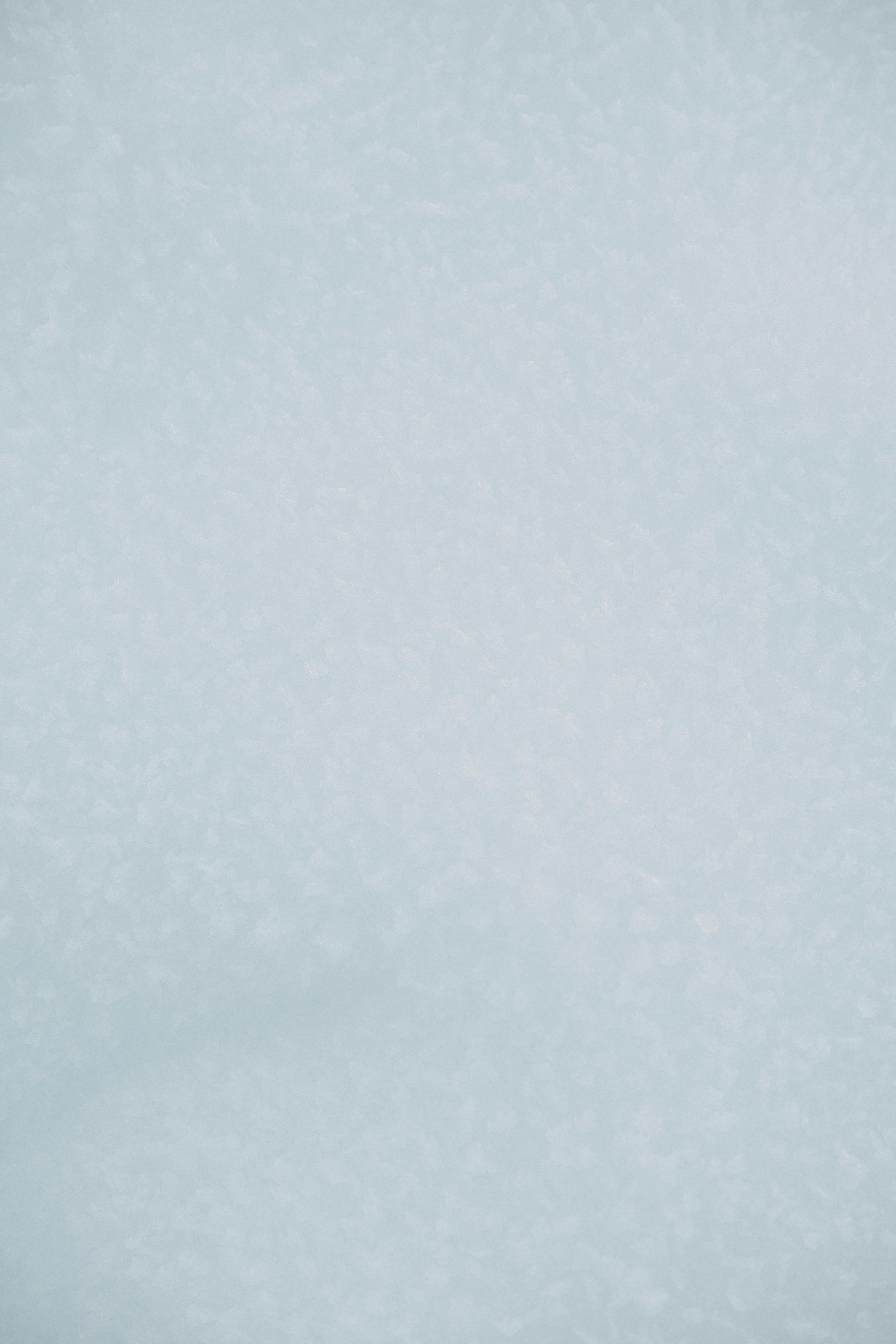 gratis Zachte en minimalistische lichtblauwe textuur, perfect voor achtergronden en overlays. Stockfoto