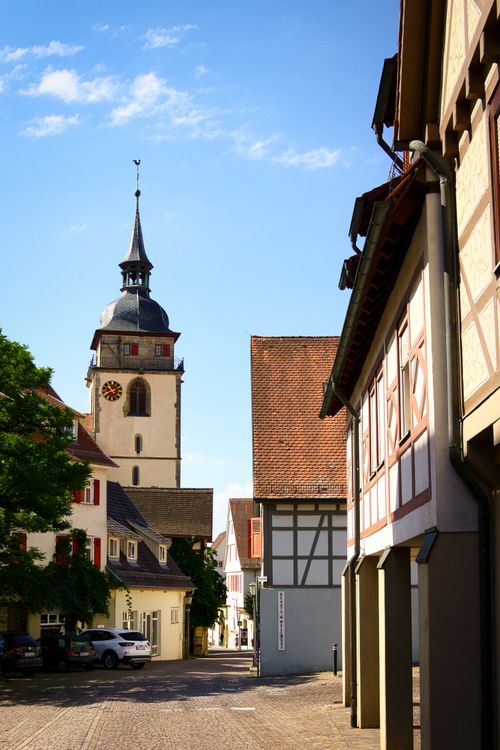 Free Charming street view of Bietigheim-Bissingen with historic buildings and church tower. Stock Photo