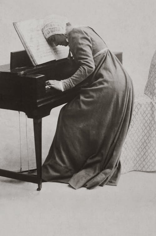 Free Old Photo Of Woman Playing Piano Stock Photo
