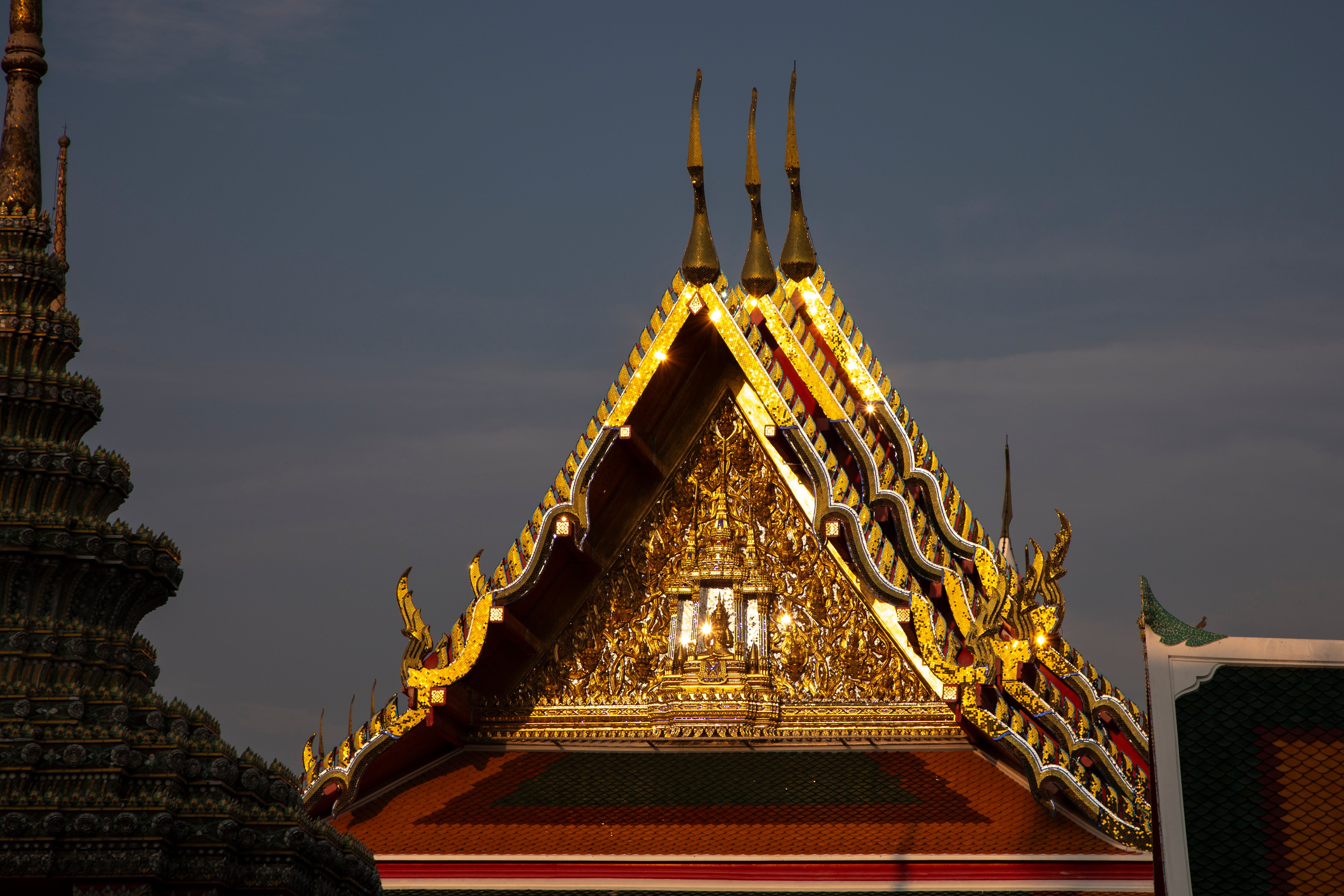 Golden Roof Temple in Thailand at Sunset · Free Stock Photo