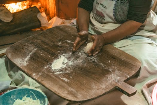 Experience traditional Turkish bread making with dough preparation by the fire.