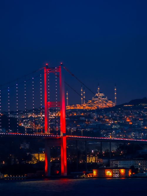 Free Stunning night view of illuminated Bosphorus Bridge and mosque in Istanbul. Stock Photo