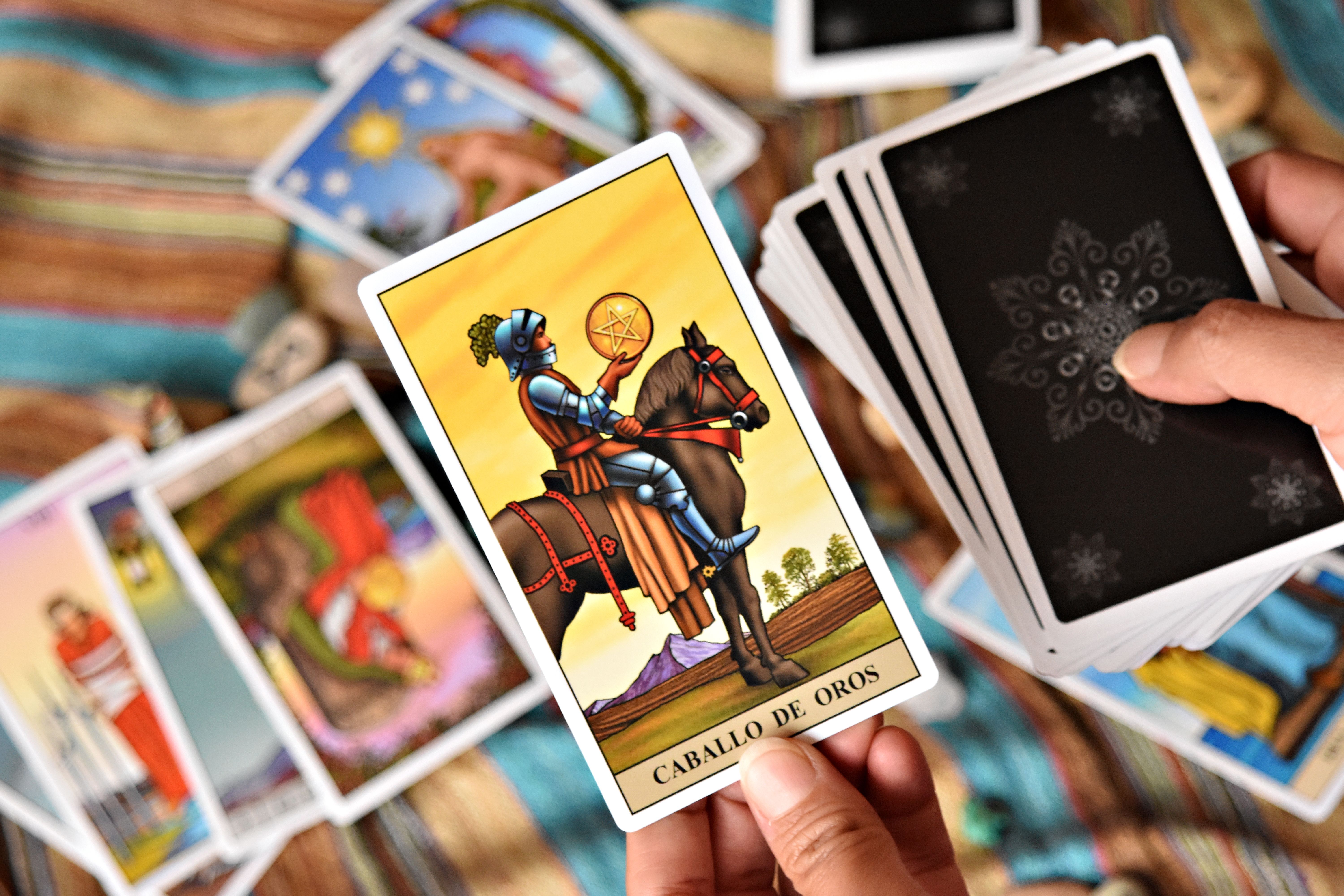 Colorful Tarot Card Reading in Progress · Free Stock Photo