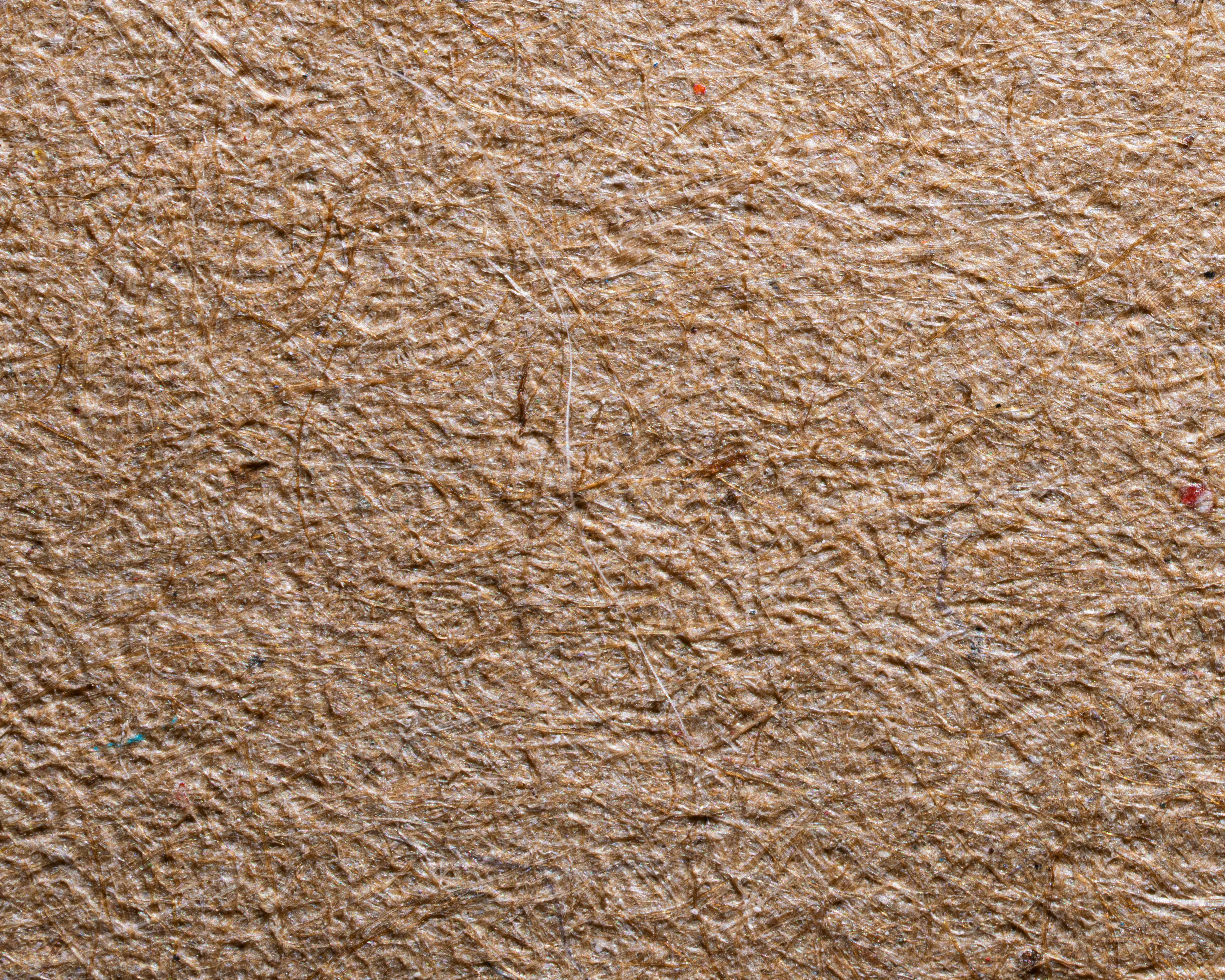 Kostenlos Nahaufnahme der Textur von braunem Recyclingpapier mit sichtbaren Fasern. Stock-Foto