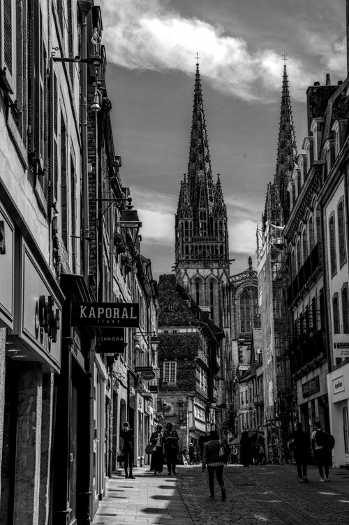 Free Monochrome view of Quimper's historic architecture and street life. Stock Photo