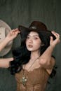 Stylish Portrait of Woman in Cowboy Hat