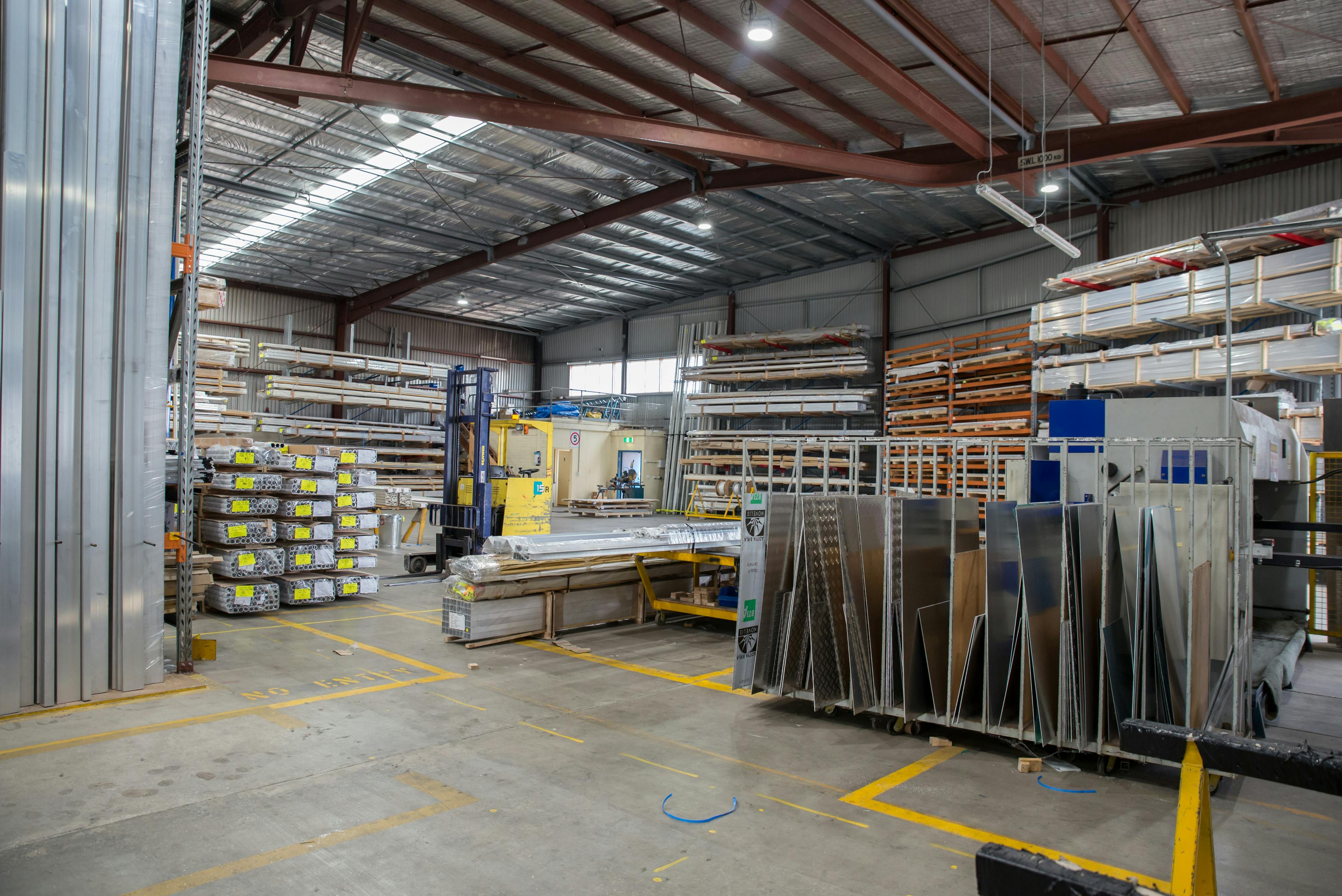 Close-up of stacked rusty steel reinforcing bars used in construction.