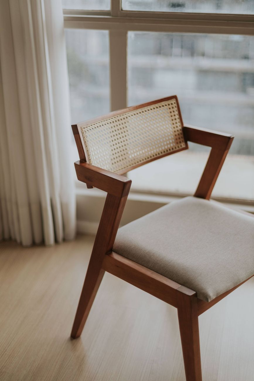 Stylish mid-century modern wooden chair with fabric seat in a bright sunlit room.. pexels, stylish, century