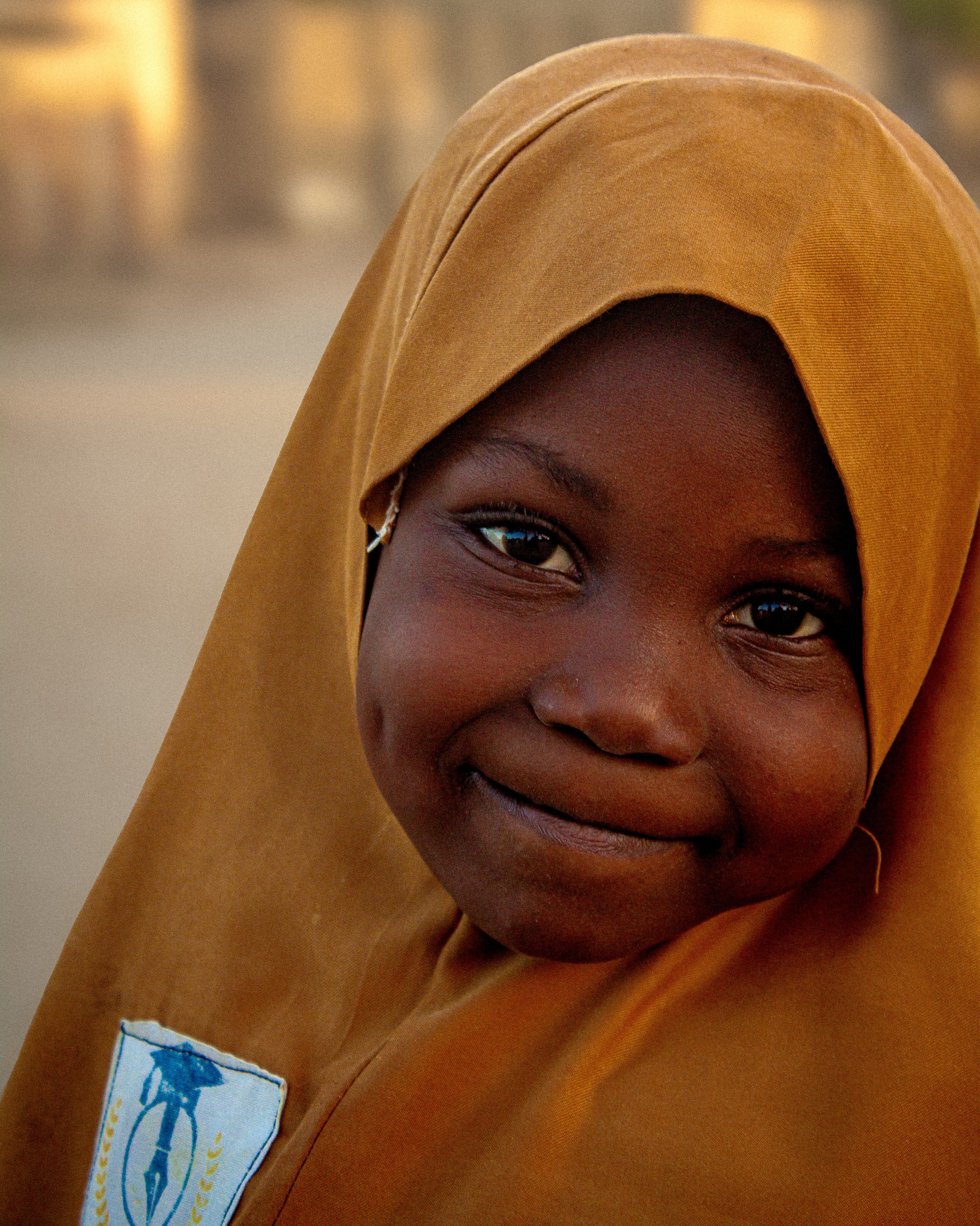 Smiling Young Girl in Traditional Hijab · Free Stock Photo