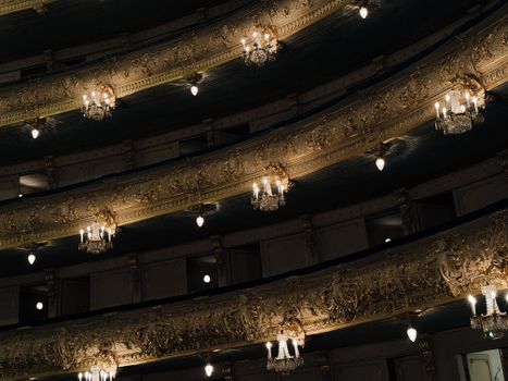 Ornate balconies and chandeliers inside the historic Mariinsky Theatre in Saint Petersburg.