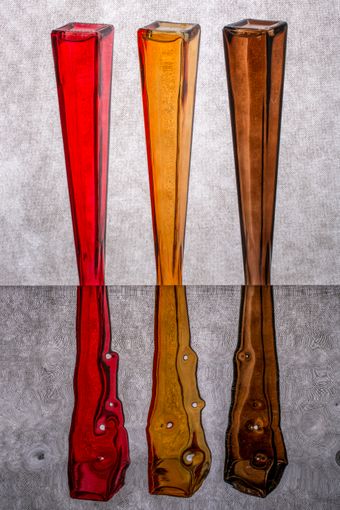 Three tall ribbed glass vases, photo by Valentin Ivantsov on Pexels
