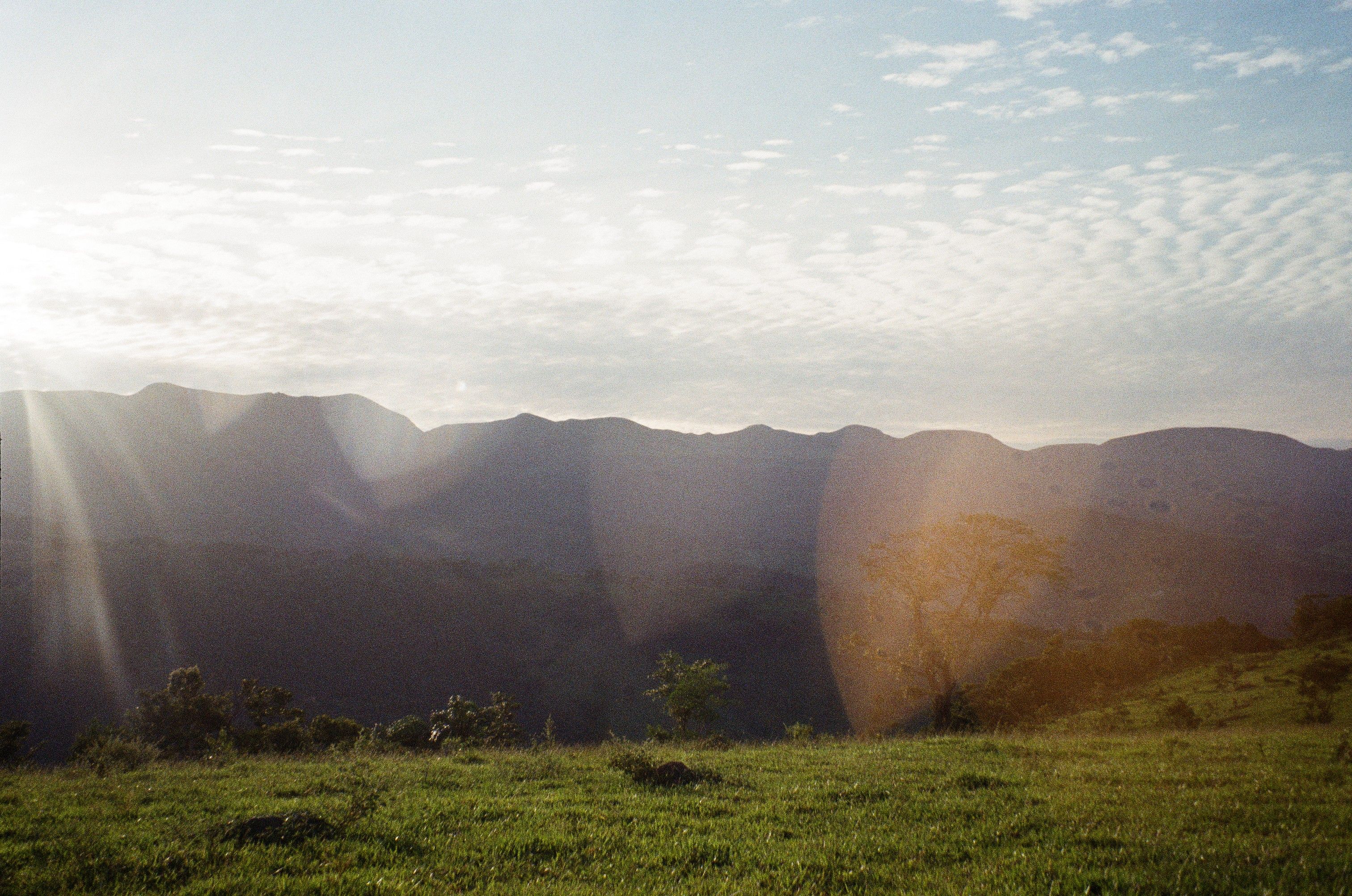 Serene Sunrise Over Misty Mountain Landscape · Free Stock Photo