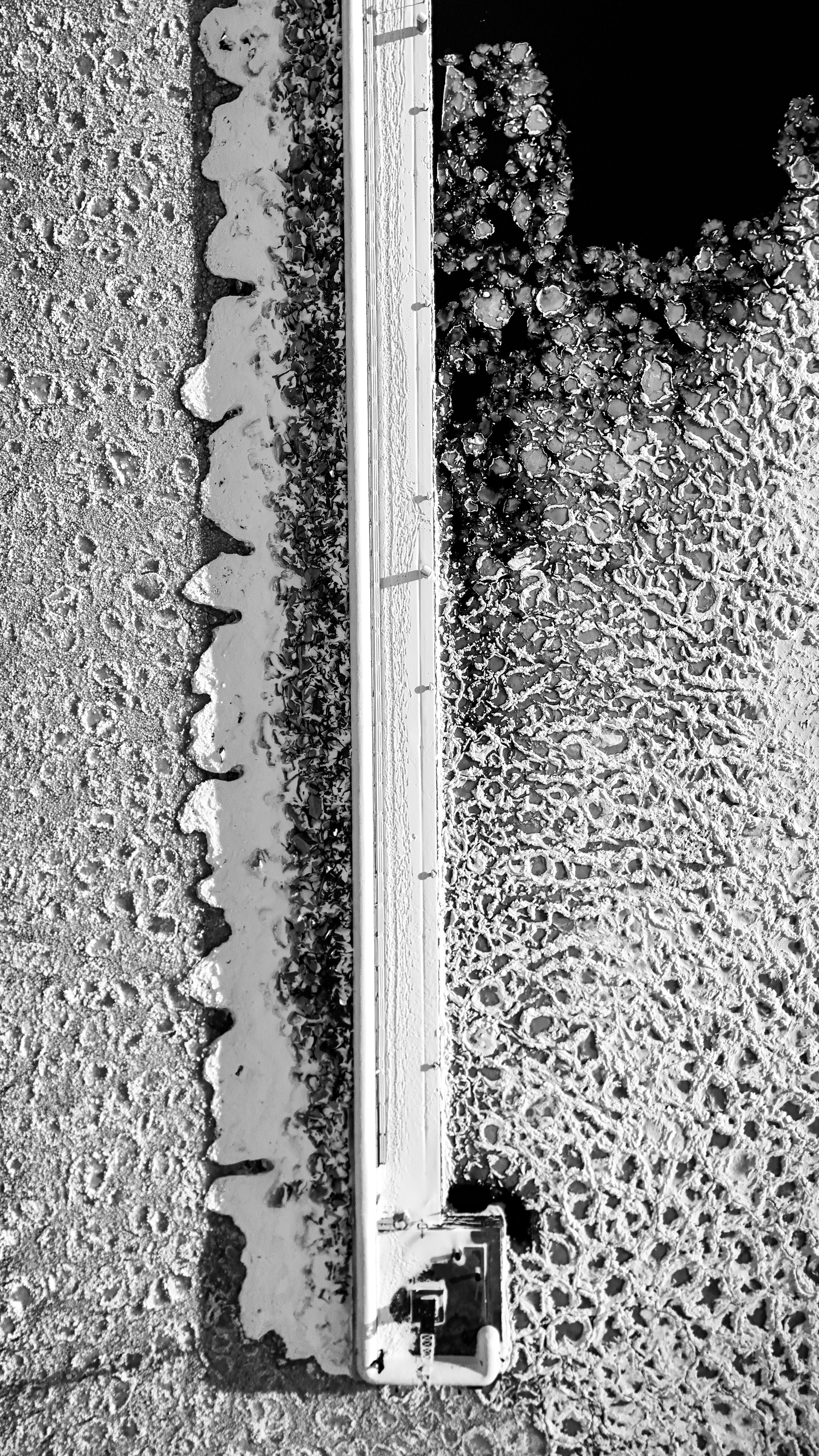 Free Aerial view of a frozen pier and icy patterns in Jönköping, Sweden. Stock Photo