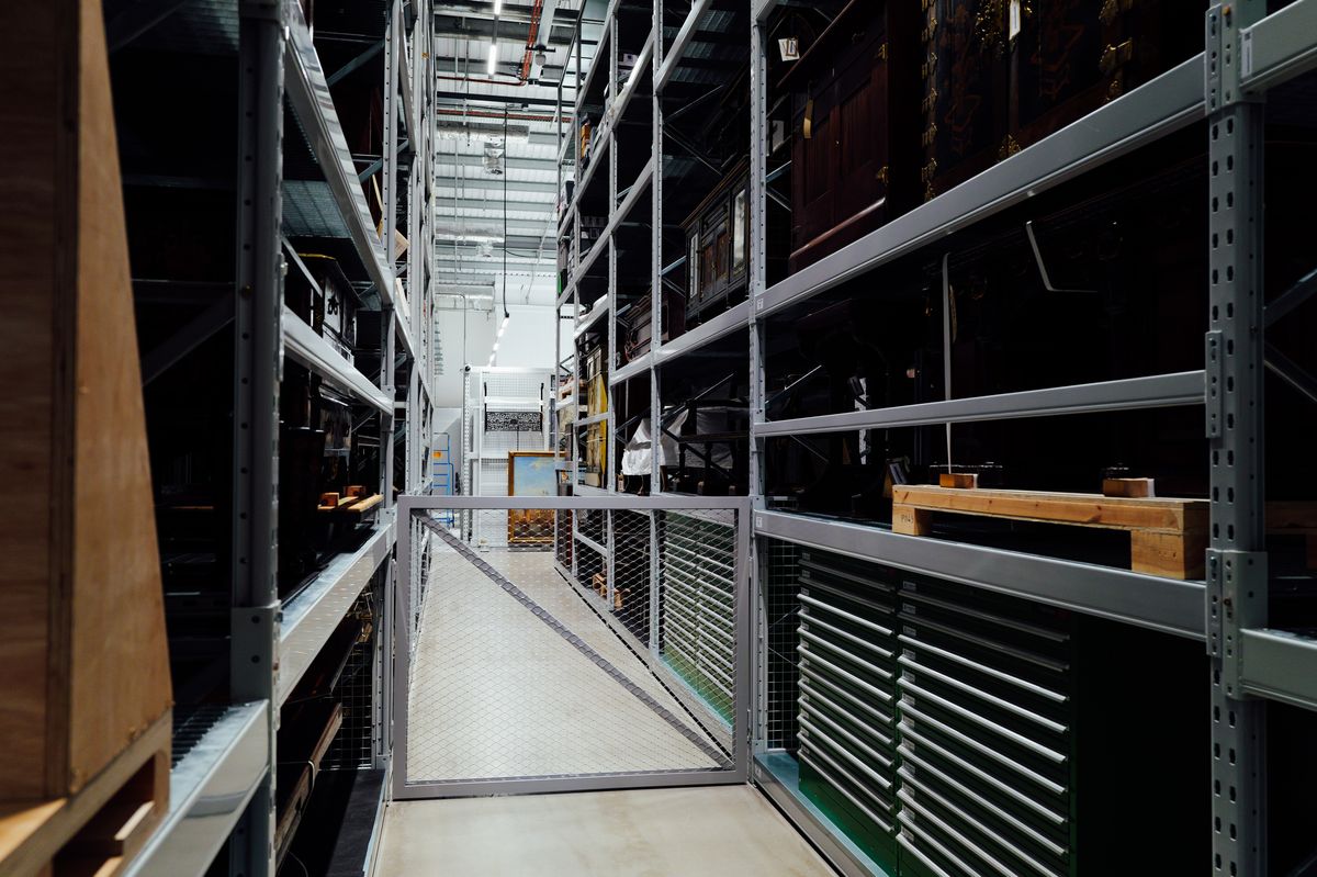 Industrial warehouse interior with organized storage infrastructure