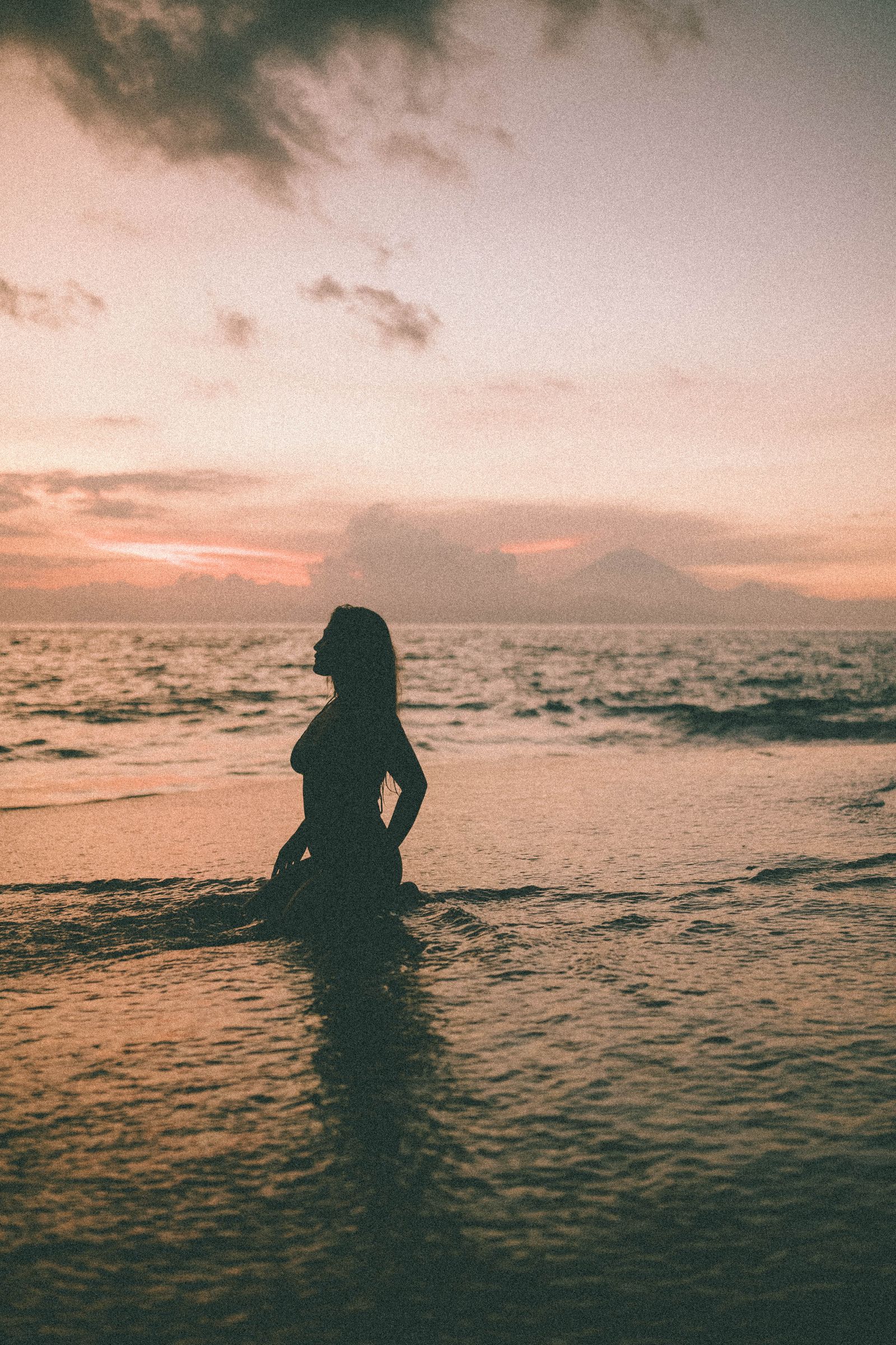 A Woman in a Bikini on a Beach · Free Stock Photo