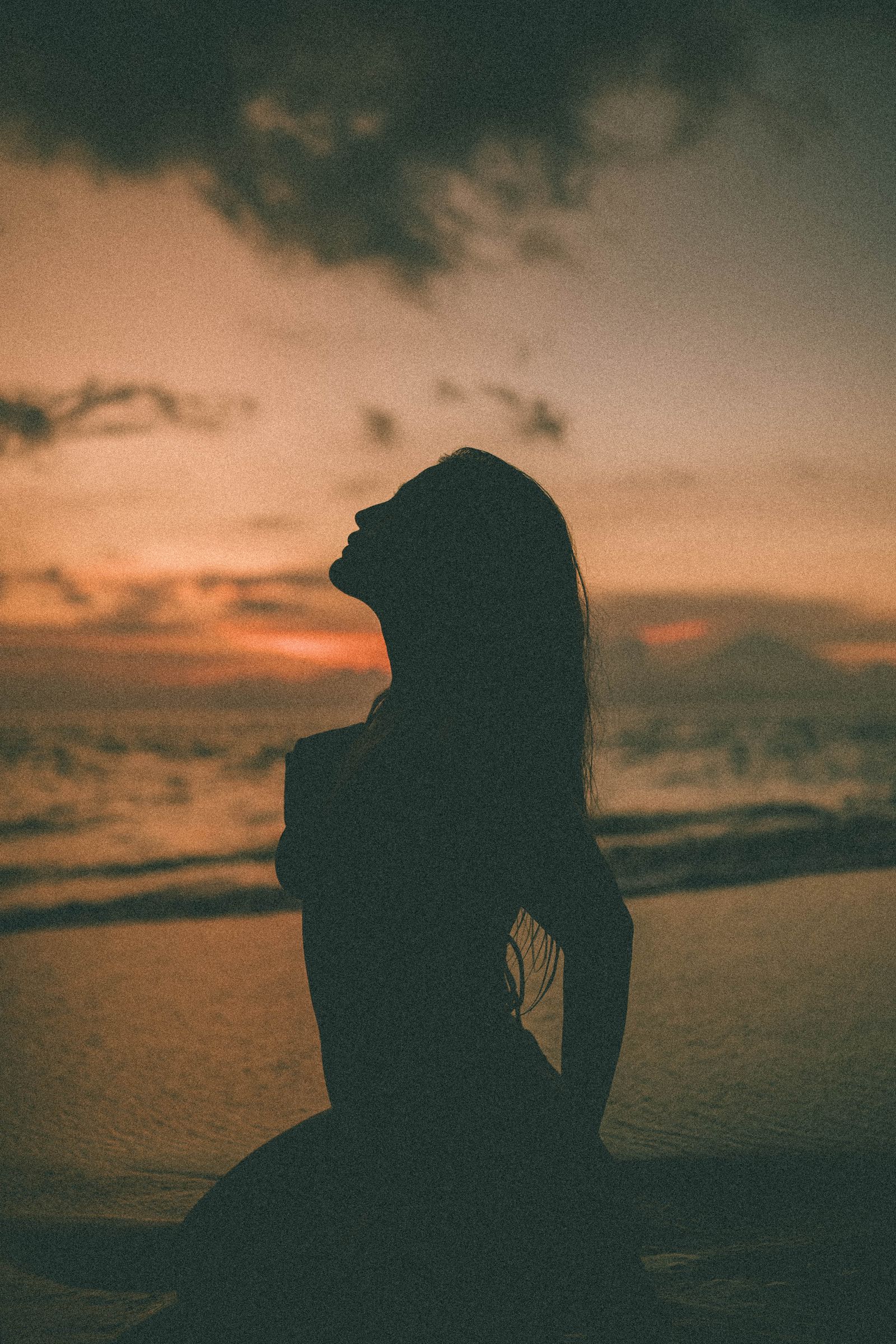 A Woman in a Hat on a Beach · Free Stock Photo