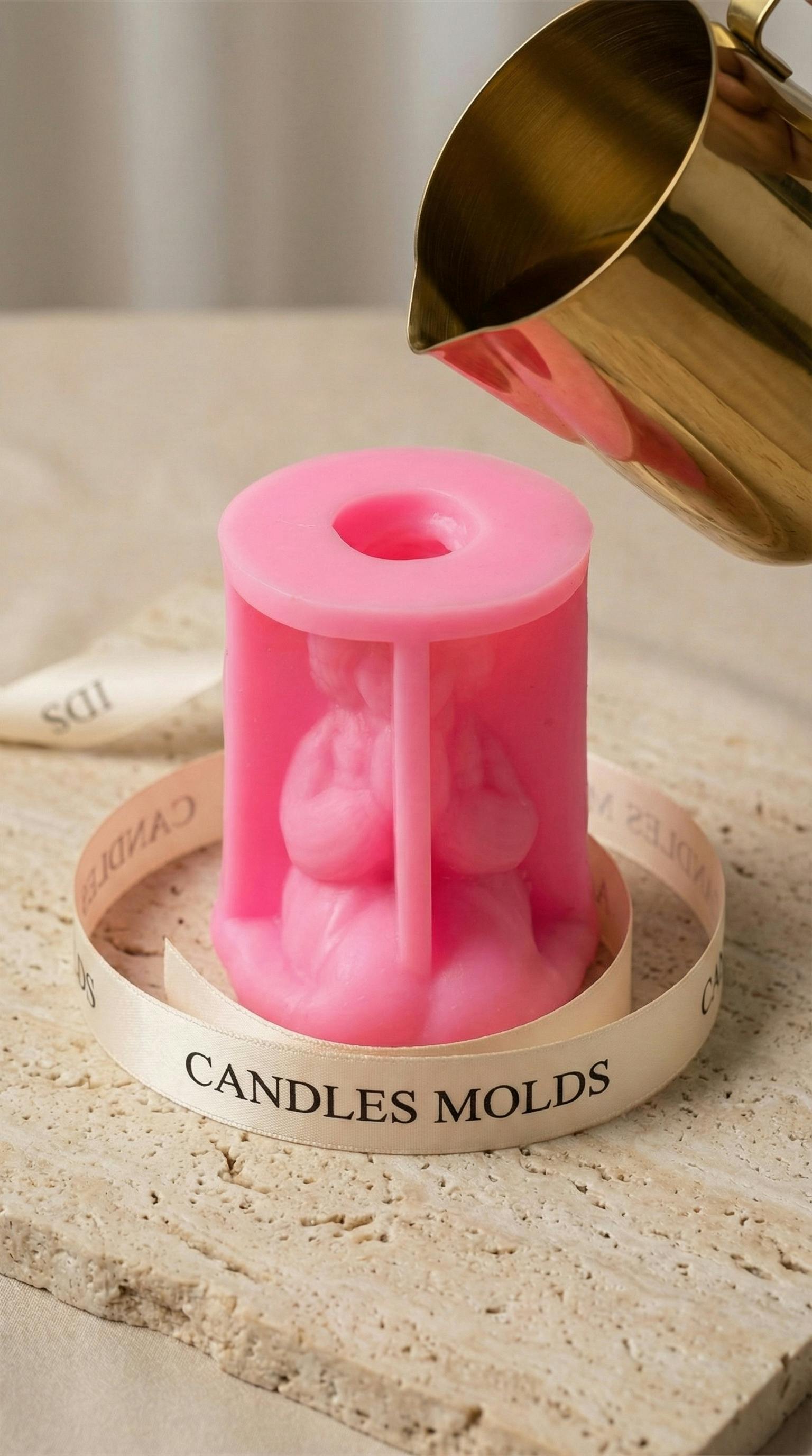 Close-up of a candle making process with pink silicone mold in New York City. Ideal for DIY and eco-friendly decor.