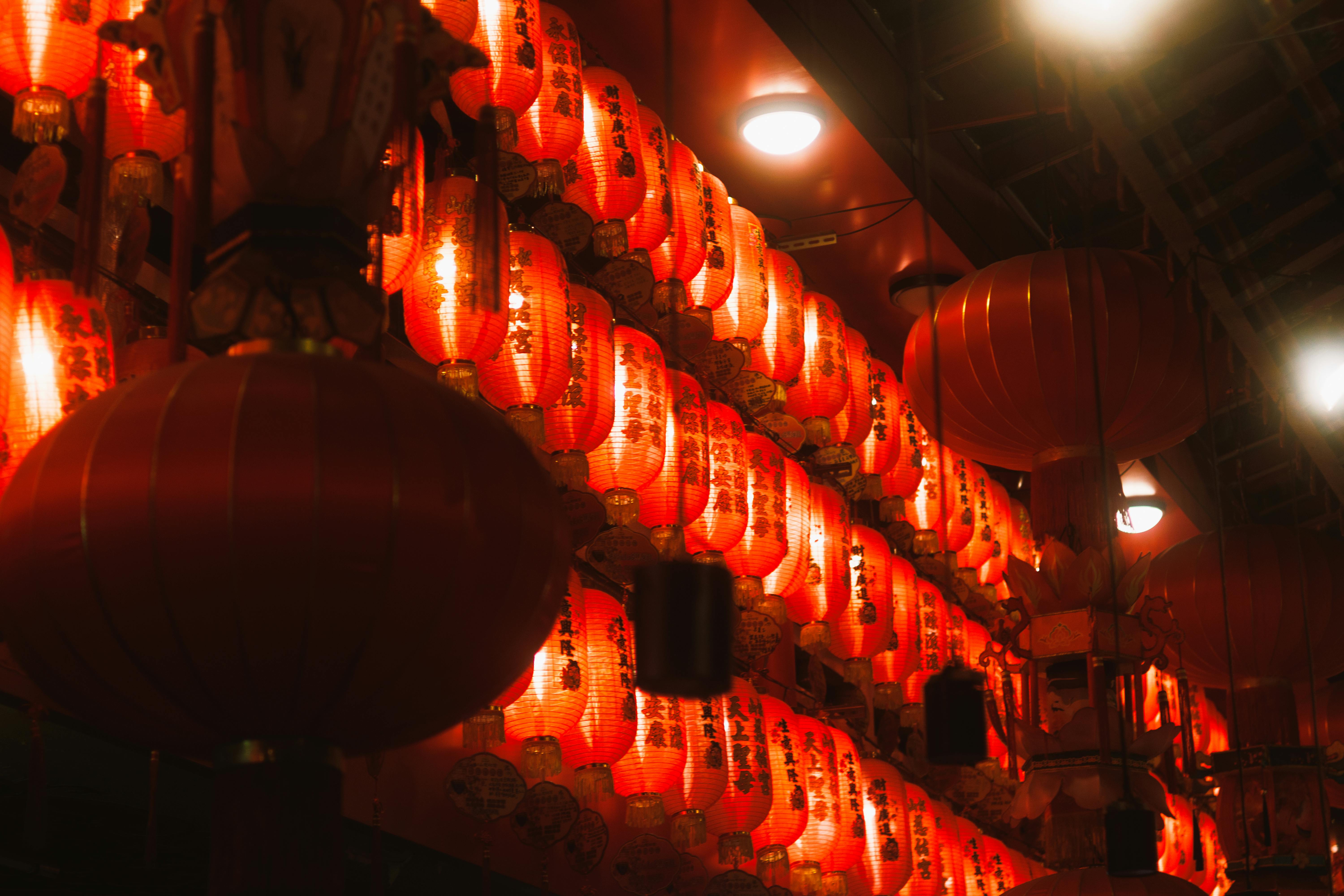 Illuminated red lanterns creating a festive atmosphere during Chinese New Year celebration.