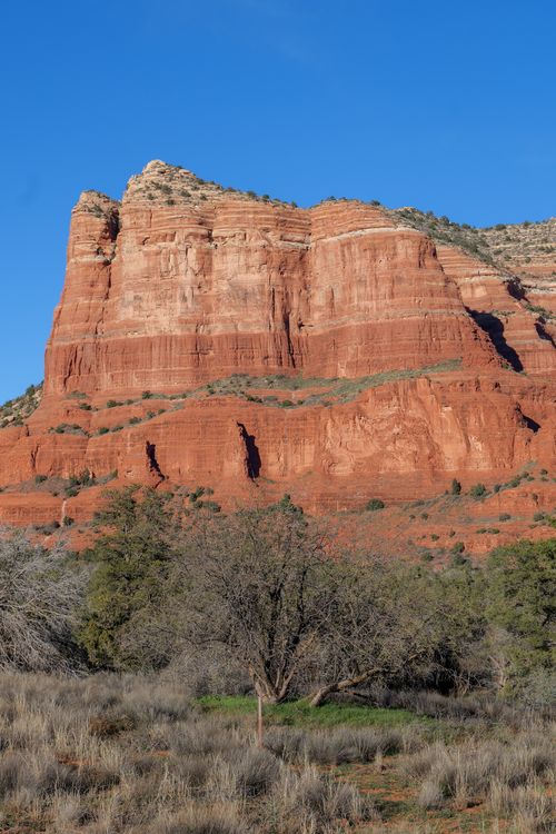 Free Stunning view of iconic Sedona red rock formations under a clear blue sky. Stock Photo