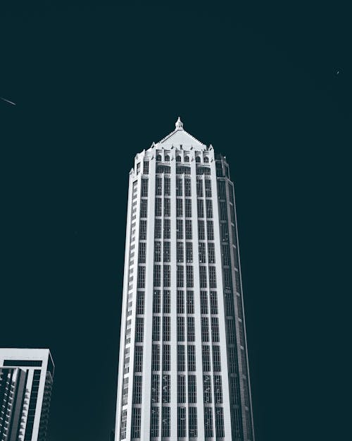 Grayscale Photo of High Rise Building