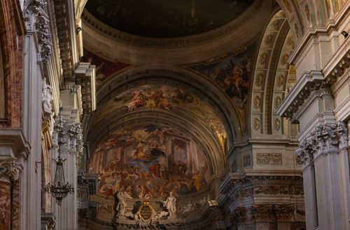 Free Exploring the rich details and frescoes of a Baroque church interior, showcasing artistry and architectural grandeur. Stock Photo