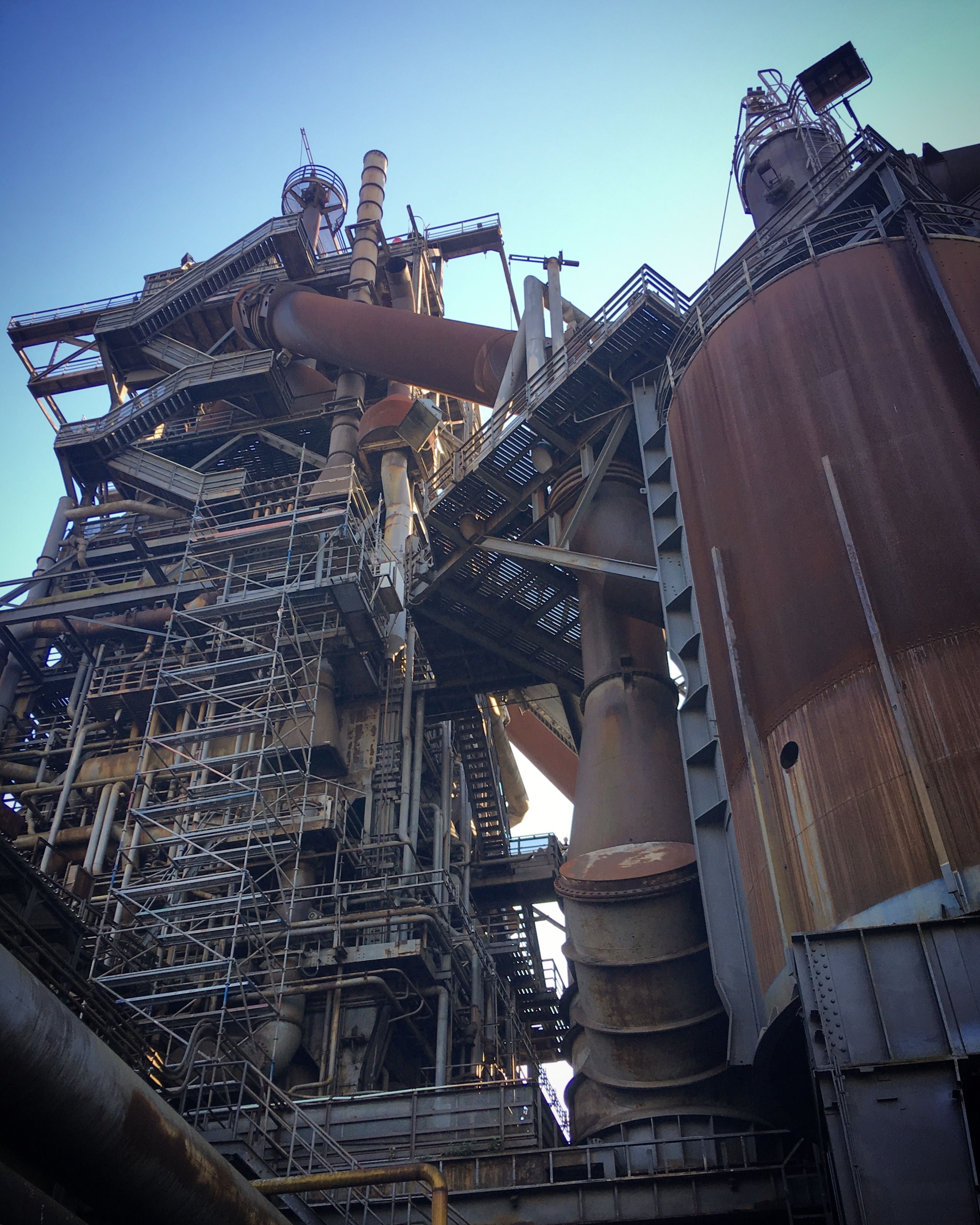 Industrial Steel Structure Against Blue Sky · Free Stock Photo