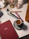 Elegant Workspace with Coffee and Pens
