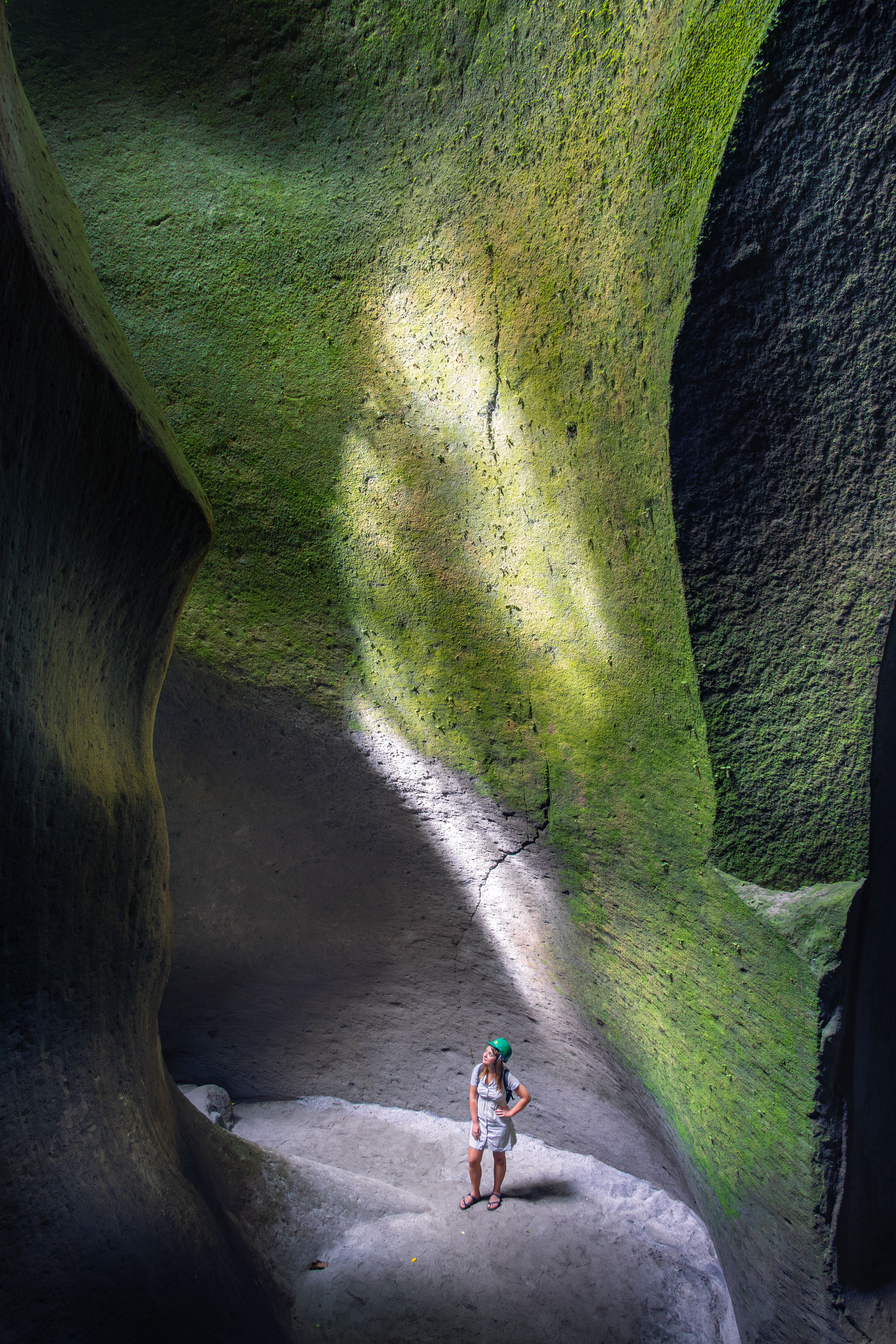 Traveler discovering stunning cave formations in Angeles, Central Luzon.