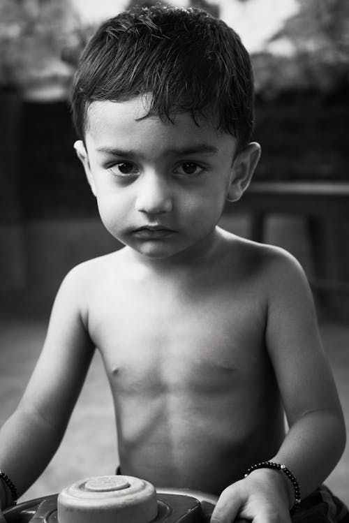 Free  Grayscale Photography of a Boy Stock Photo